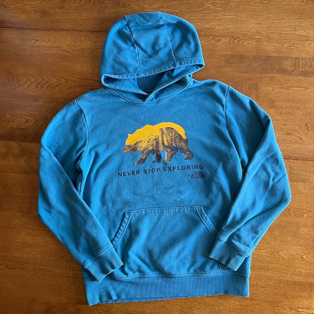 The North Face blue and yellow hoodie L 14/16